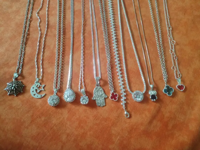 Conjunto de pulseras y collares de plata variados - 3