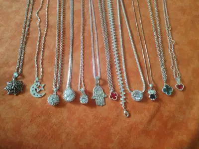 Conjunto de pulseras y collares de plata variados - miniatura 3