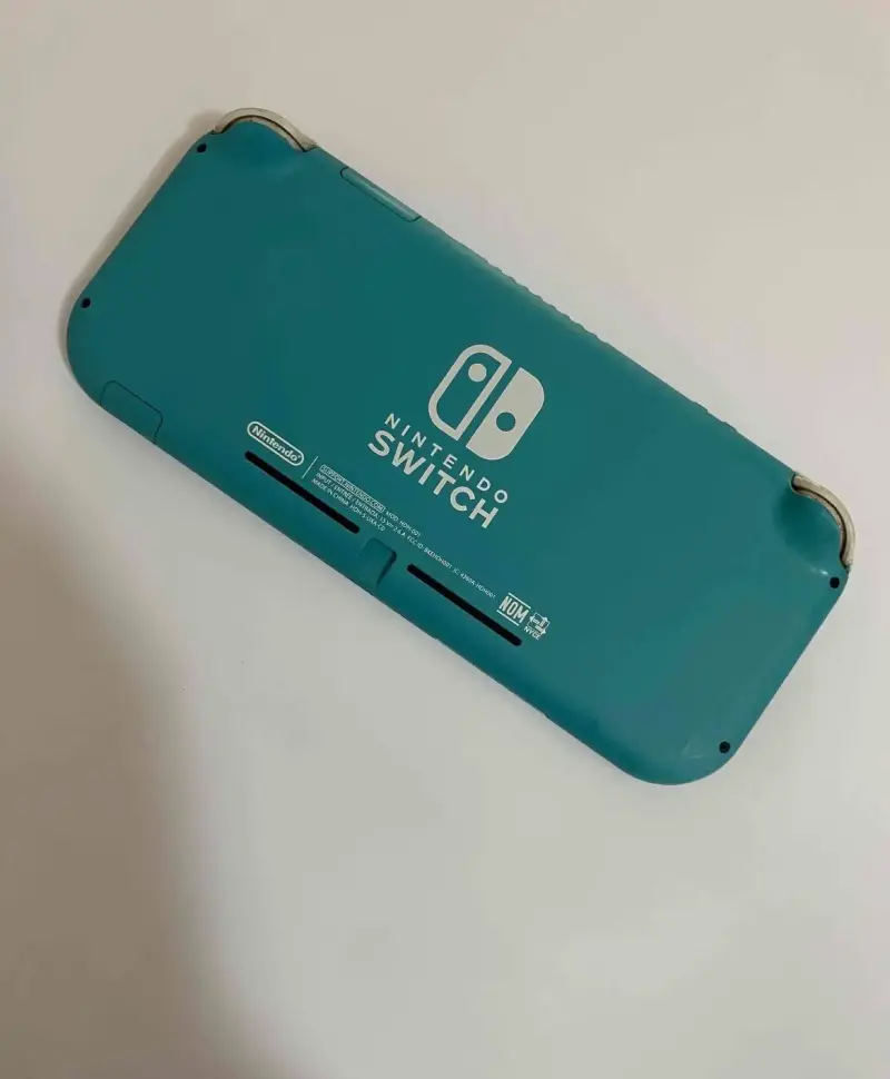 Nintendo Switch Lite turquesa en buen estado - 2