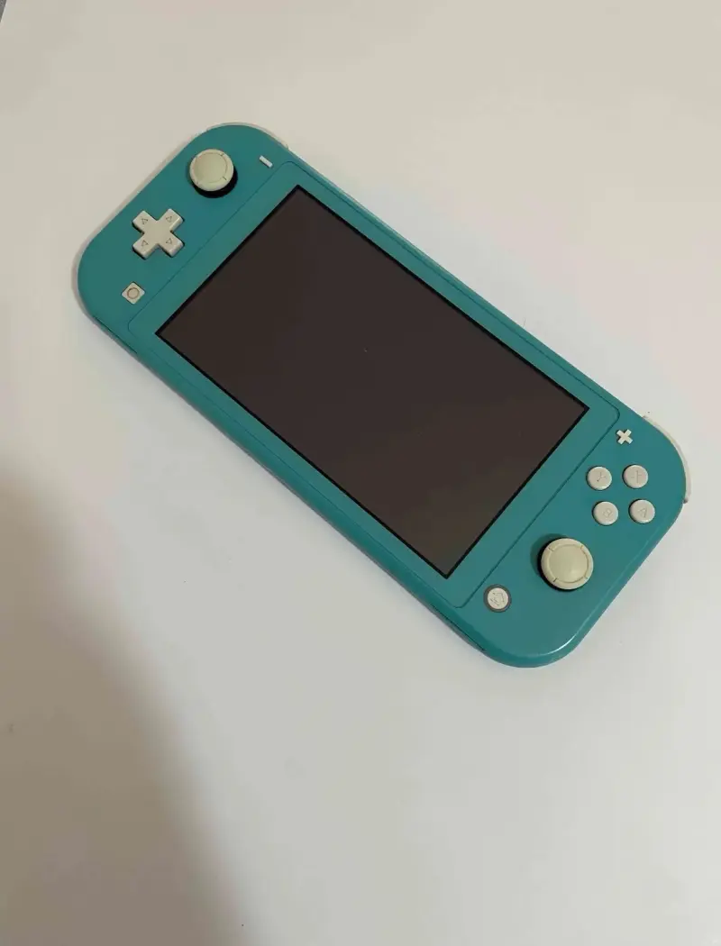 Nintendo Switch Lite turquesa en buen estado - 3