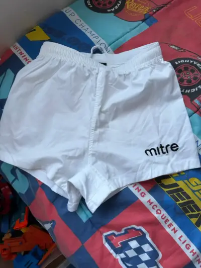 Shorts deportivos blancos Mitre para niño - miniatura 1