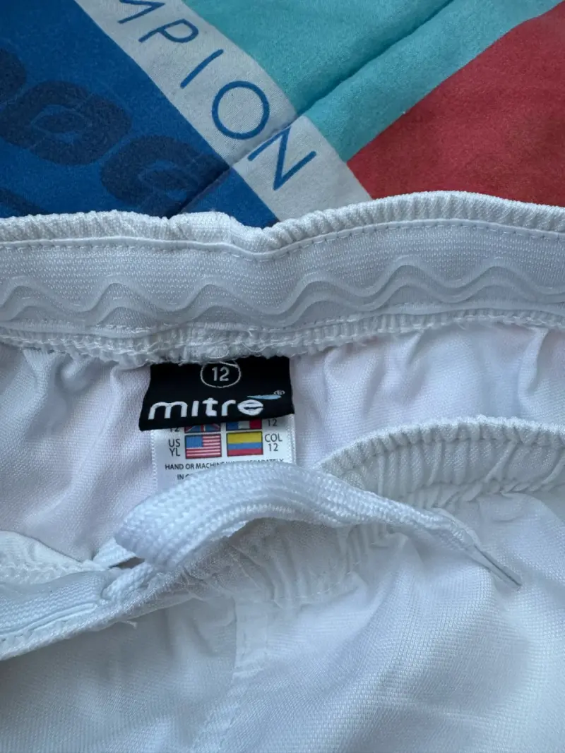 Shorts deportivos blancos Mitre para niño - 4