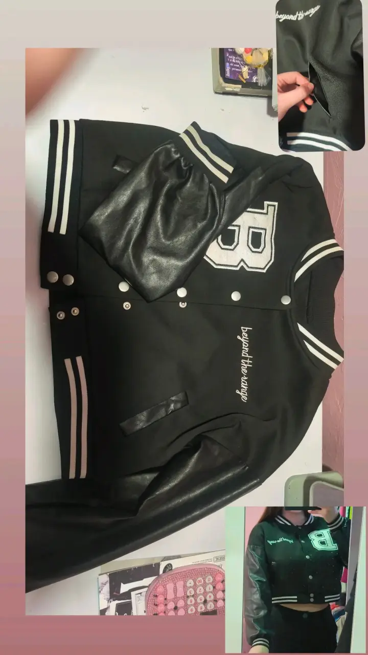 Chaqueta tipo varsity negra con detalles bordados