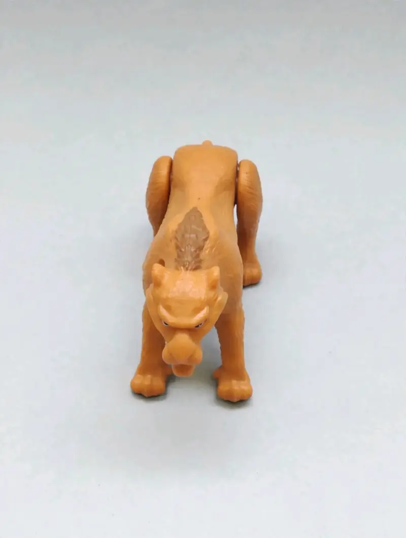 Figura de juguete de felino prehistórico