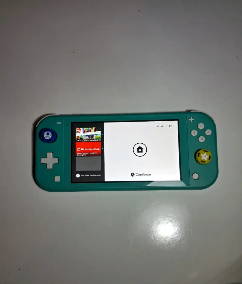 Nintendo Switch Lite turquesa + cargador + carcasa - 2