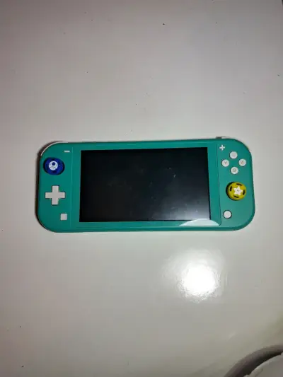 Nintendo Switch Lite turquesa + cargador + carcasa - miniatura 3
