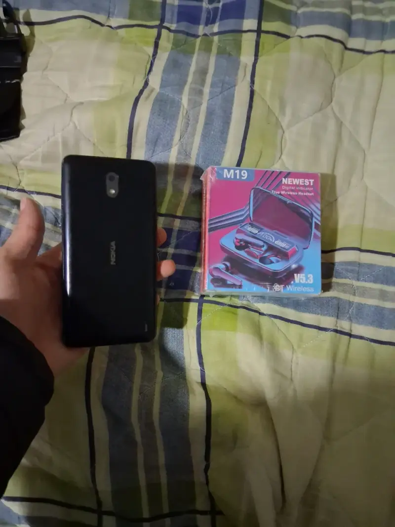 Teléfono Nokia con auriculares inalámbricos M19 - 2