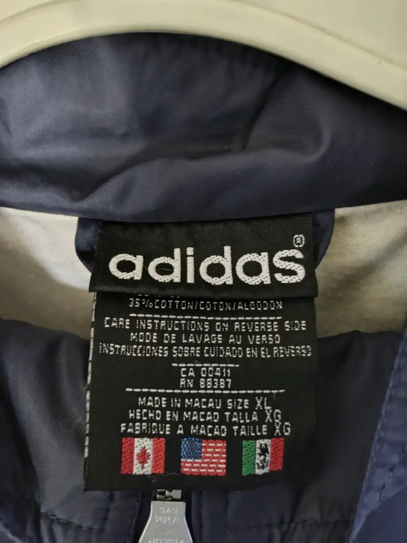 Chaqueta cortaviento Adidas azul y blanca - 2