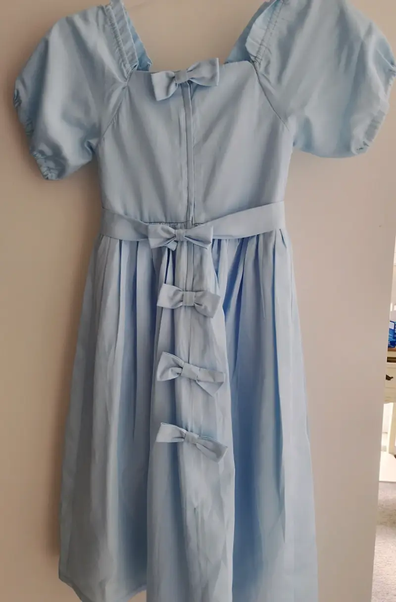 Vestido azul claro con lazos para niña - 2
