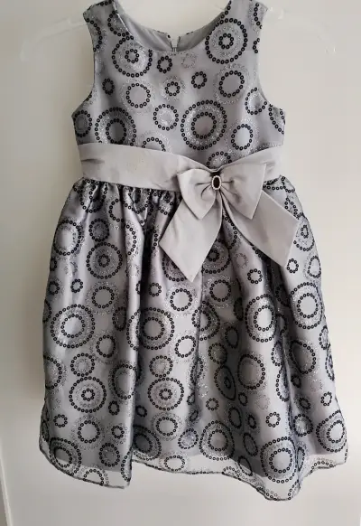 Vestido de fiesta para niña con lazo y estampado circular - miniatura 1