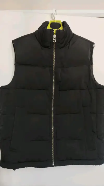 Chaleco sin mangas negro Gap Warmest - miniatura 1