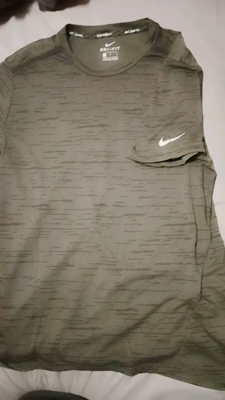 Polera Nike Running Dri-Fit gris un uso. - 1