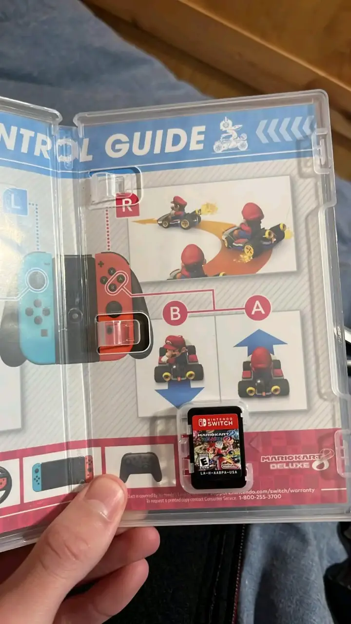 Nintendo Switch con juego Mario Kart y accesorios - 3