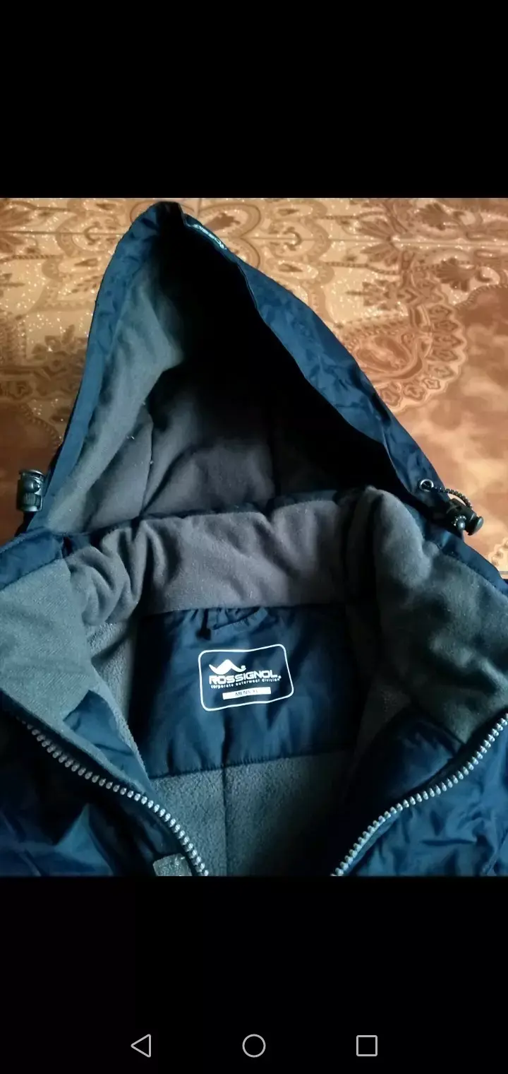 Chaqueta impermeable azul con capucha - 2