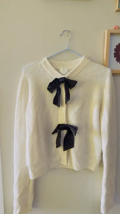 Cardigan blanco con lazos negros H&M - miniatura 1