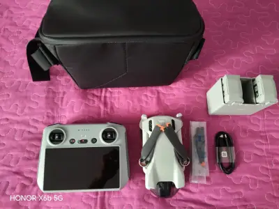 Dron Dji Mini 3 con control remoto y accesorios - miniatura 1