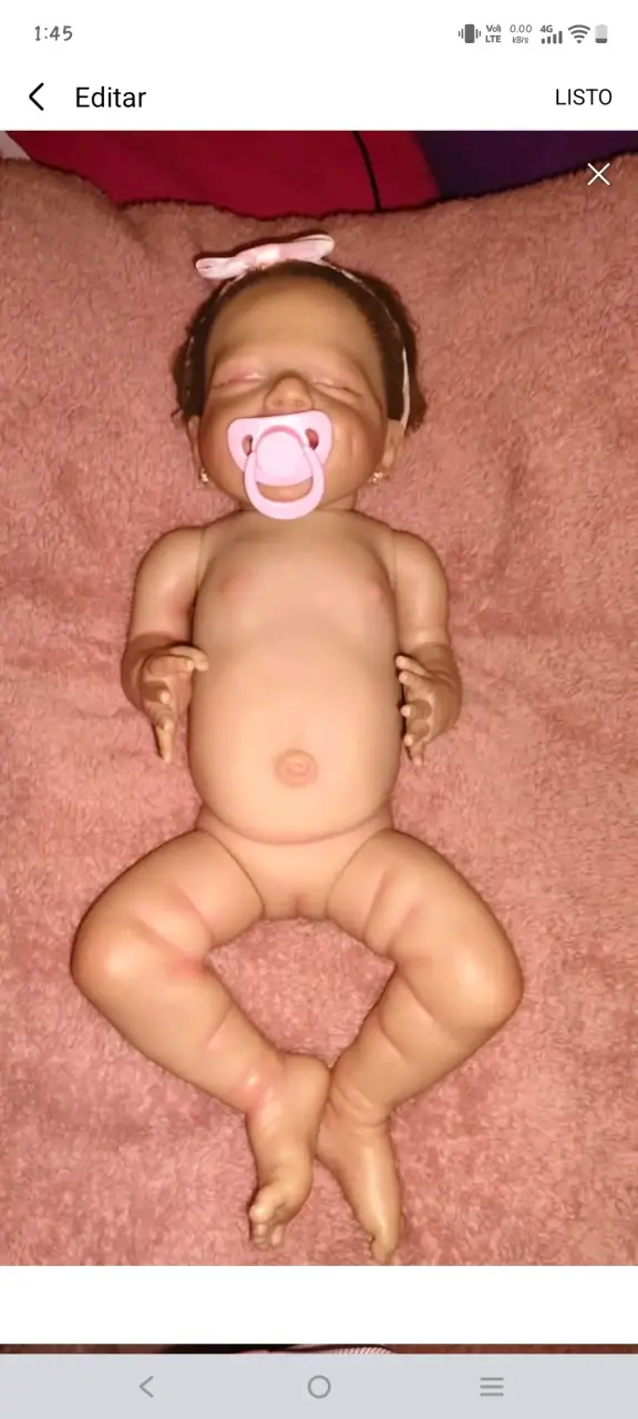 Muñeca Reborn Realista con Chupete y Ropa Floral - 2