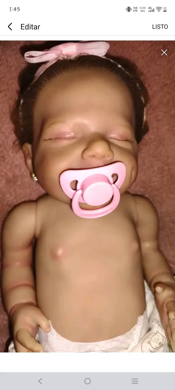 Muñeca Reborn Realista con Chupete y Ropa Floral - 3