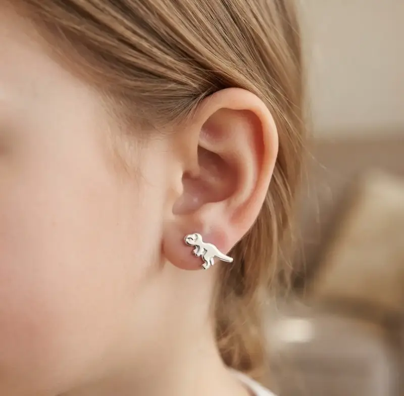 Aros de plata con diseño de dinosaurio - 1