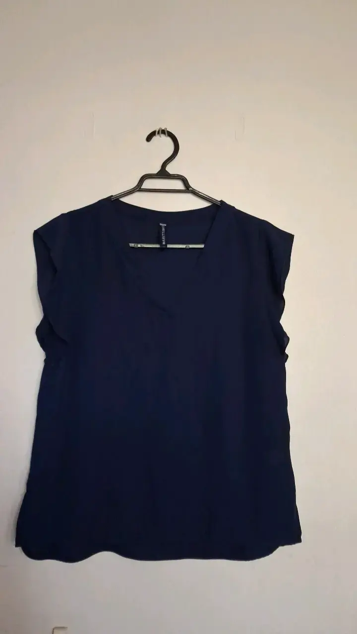 Blusa azul marino sin mangas para mujer