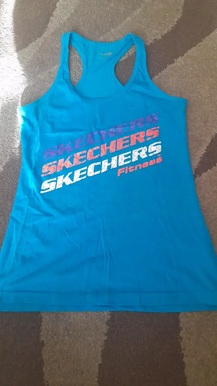 Polera deportiva azul Skechers para mujer - 1