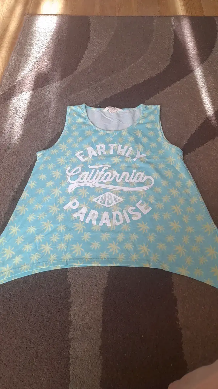 Polera sin mangas Earthly Paradise azul - 1