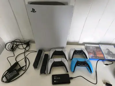 Consola PlayStation 5 con accesorios y juegos - miniatura 1