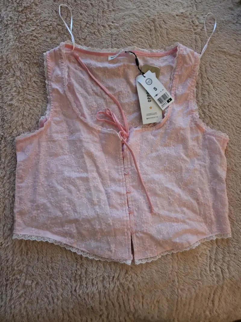 Blusa rosa de encaje sin mangas talla S