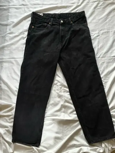 Jeans negros loose fit 46 (36/32 EUR) - miniatura 1