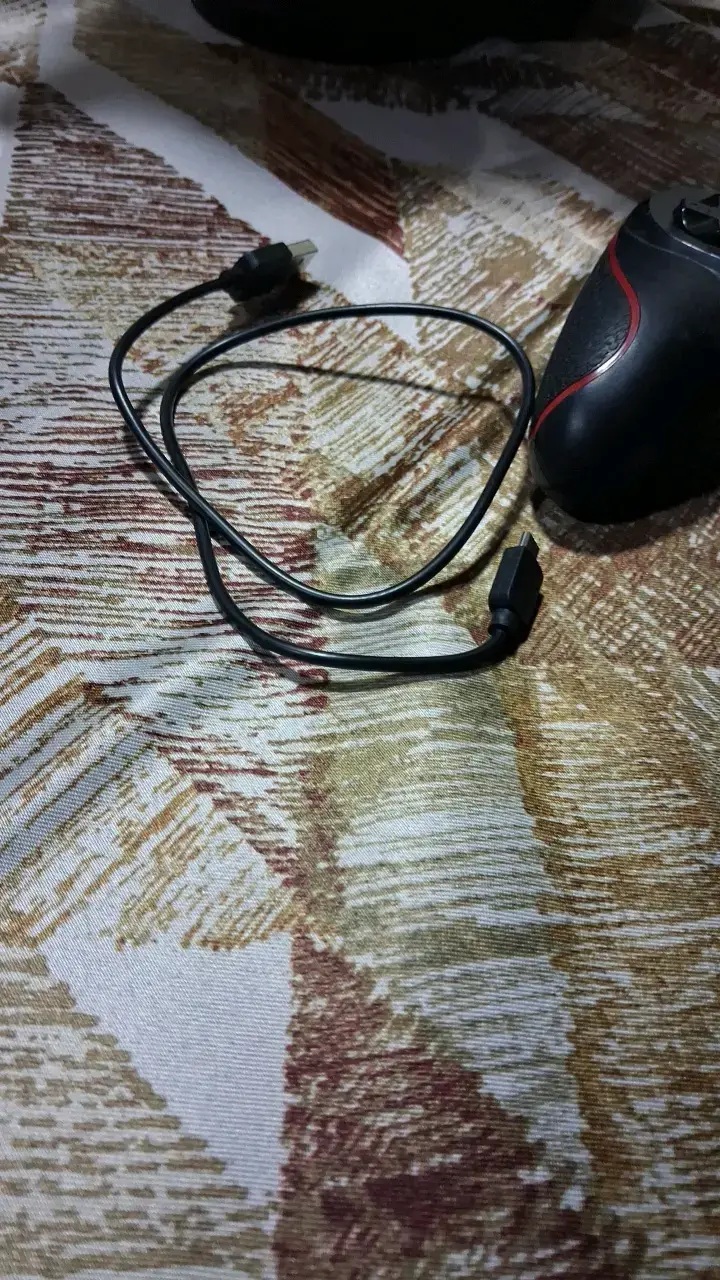 Control inalámbrico para videojuegos con diseño ergonómico - 3