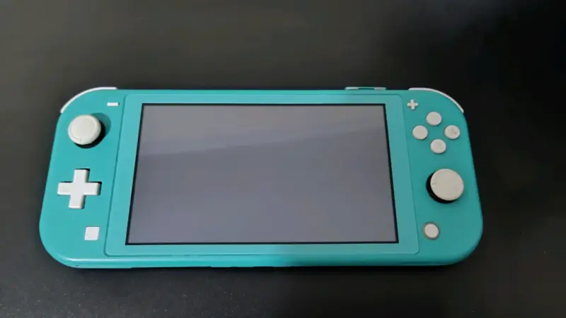 Nintendo Switch Lite turquesa con juego y estuche - 2