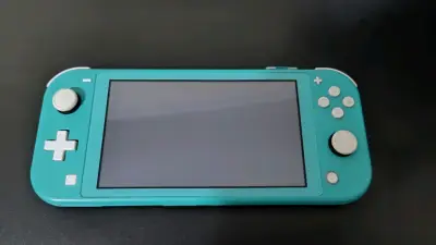 Nintendo Switch Lite turquesa con juego y estuche - miniatura 2