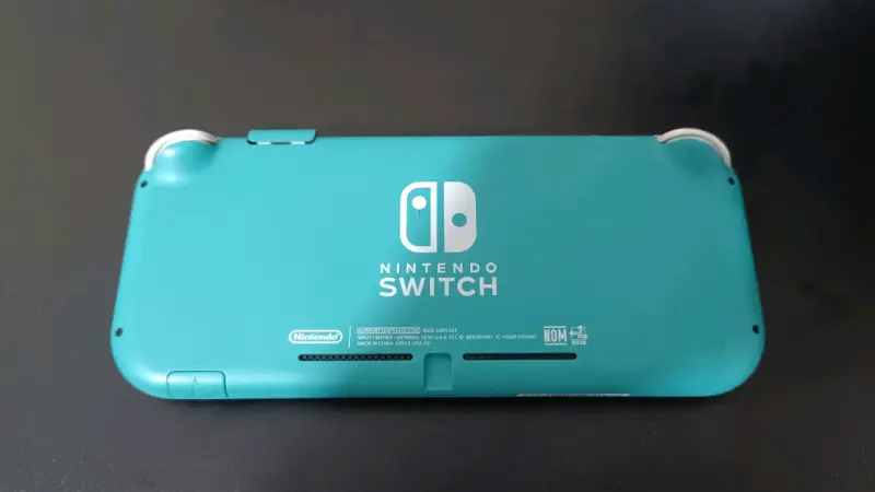 Nintendo Switch Lite turquesa con juego y estuche - 3