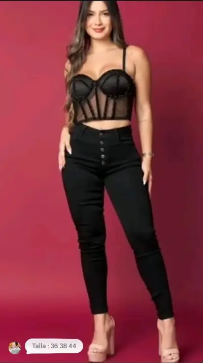 Jeans ajustados para mujer en negro y celeste - miniatura 1