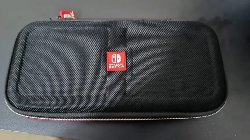 Nintendo Switch Lite turquesa con juego y estuche - 5