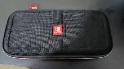 Nintendo Switch Lite turquesa con juego y estuche - miniatura 5