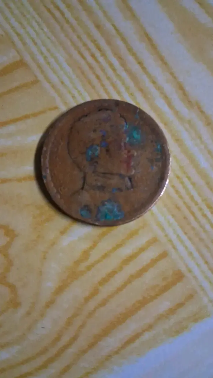 Moneda antigua de 1 peso 1942 - 2