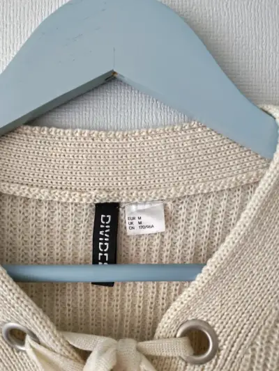 Suéter beige con cordones - miniatura 3