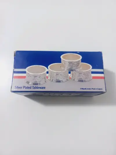 Juego de 4 servilleteros chapados en plata - miniatura 1