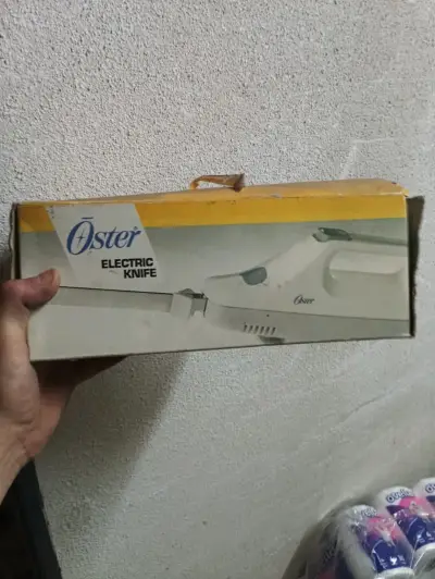 Cuchillo Eléctrico Oster en Buen Estado - miniatura 1