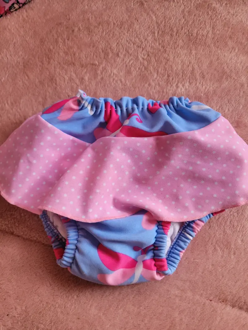Conjunto de ropa para bebé en tonos rosados - 2