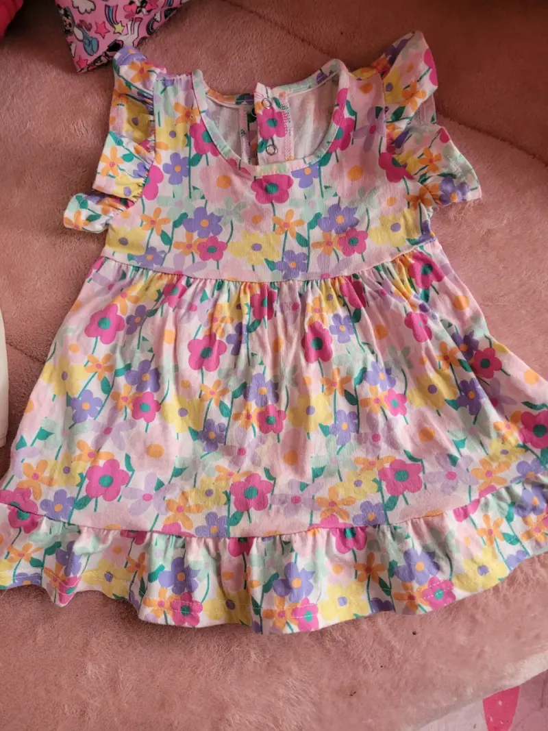 Conjunto de ropa para bebé en tonos rosados - 5