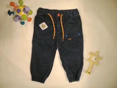 Pantalones de bebé azul oscuro con detalles naranjas - miniatura 1