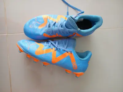 Zapatillas de fútbol Puma azules y naranjas - miniatura 1