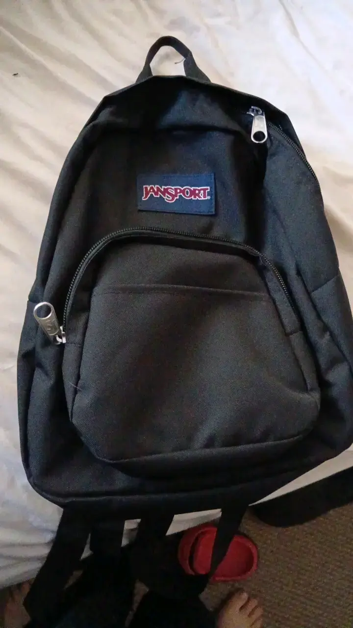 Mochila negra Jansport clásica - 1