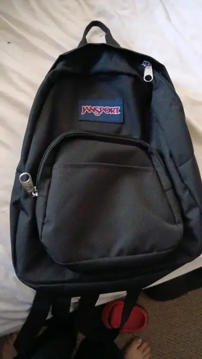 Mochila negra Jansport clásica - miniatura 1
