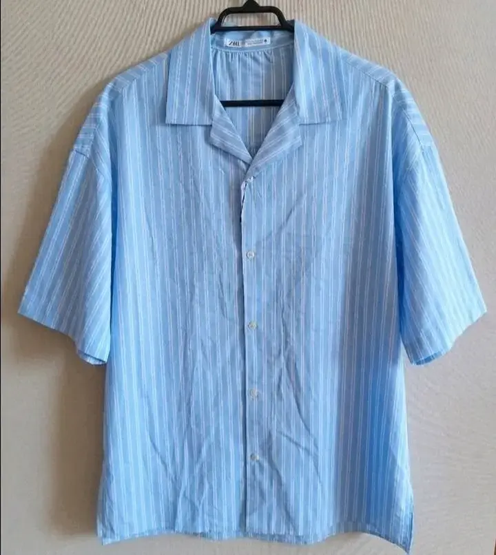 Camisa talla L azul claro Zara para hombre. - 1