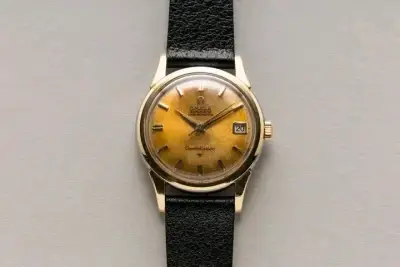 Reloj Omega Constellation vintage con correa de cuero - miniatura 1