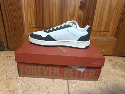 Zapatillas deportivas blancas y negras Puma - miniatura 3