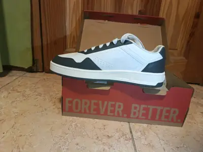 Zapatillas deportivas blancas y negras Puma - miniatura 4